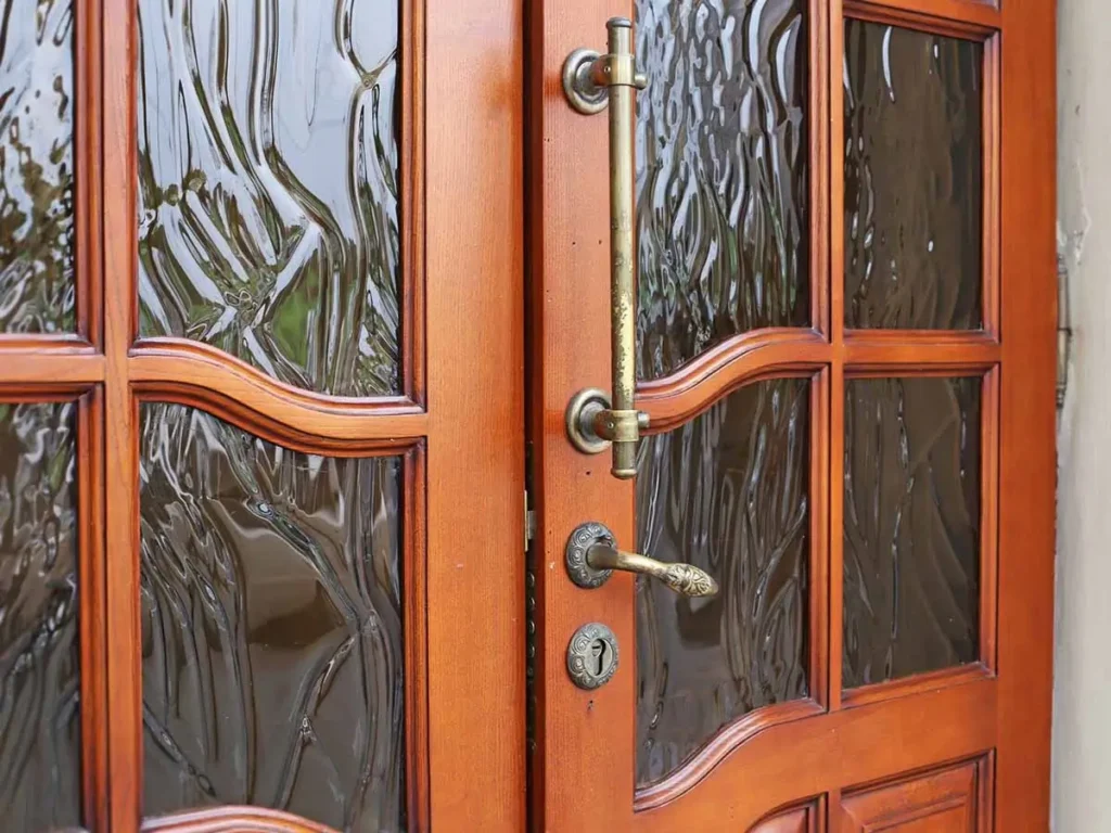 Door Replacement & Installation in East Valley featuring a custom wood entry door with decorative textured glass